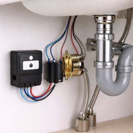 Touchless faucet control module and solenoid assembly under the sink